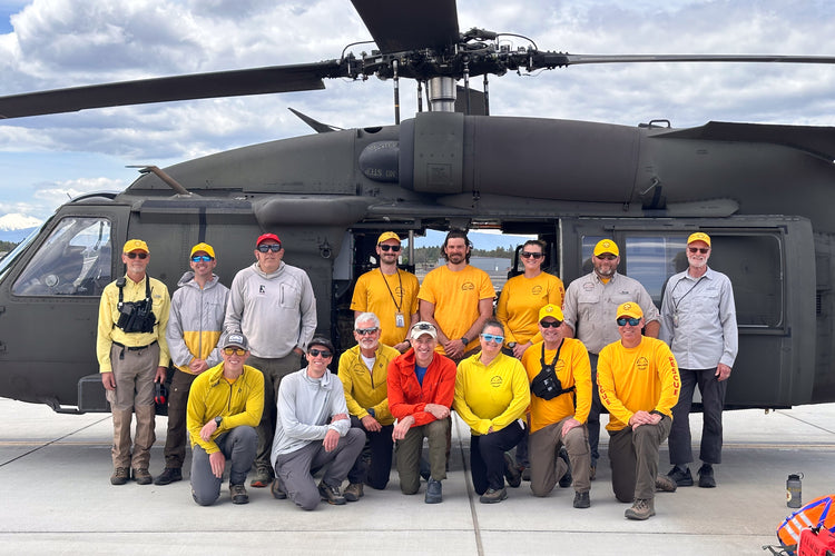 SAR team group with a helicopter