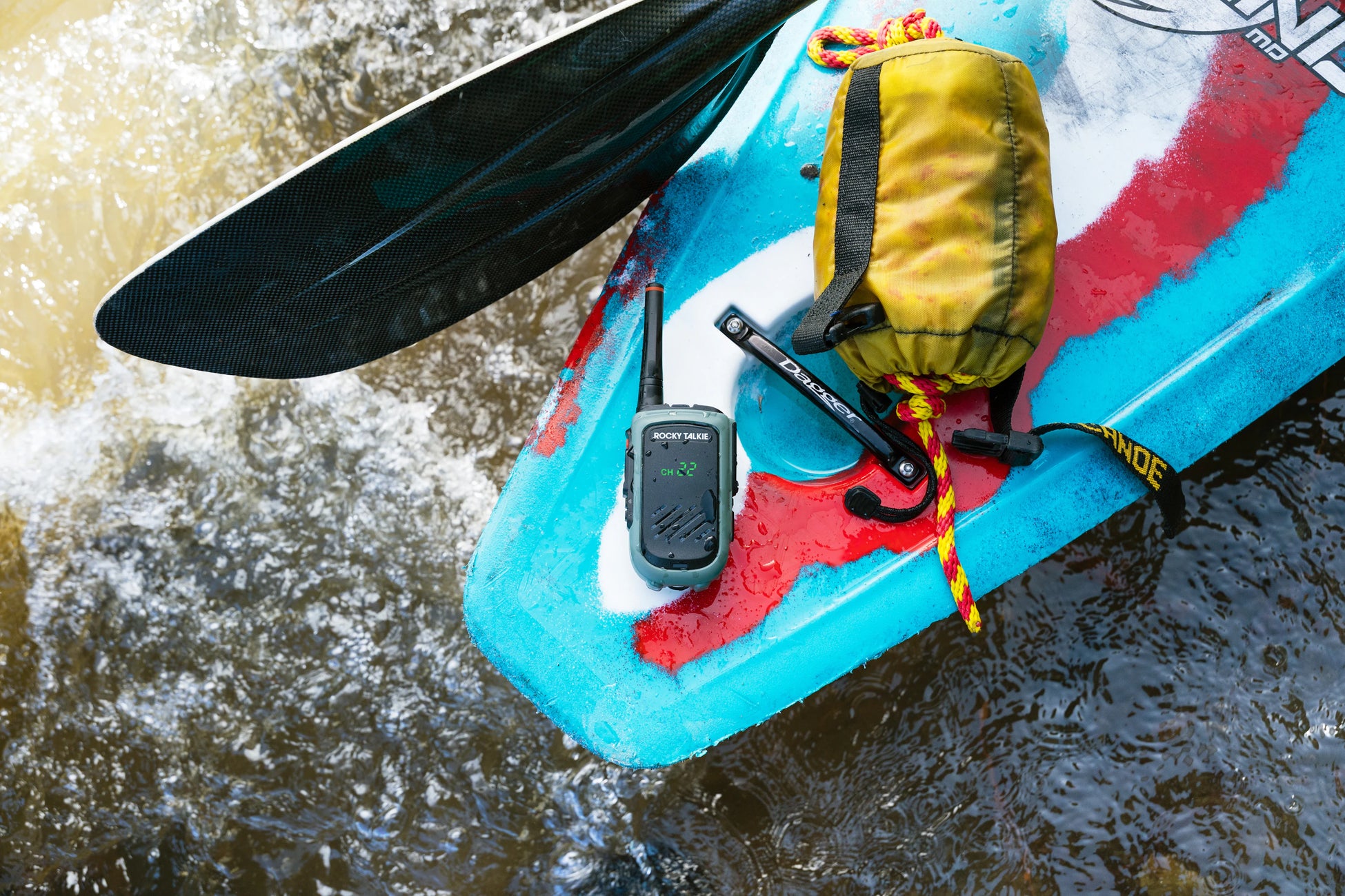 Kayak in river with Rocky Talkie radio